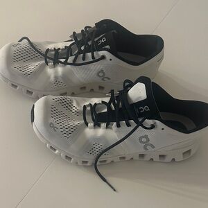 On Running Black and White Athletic Shoes
